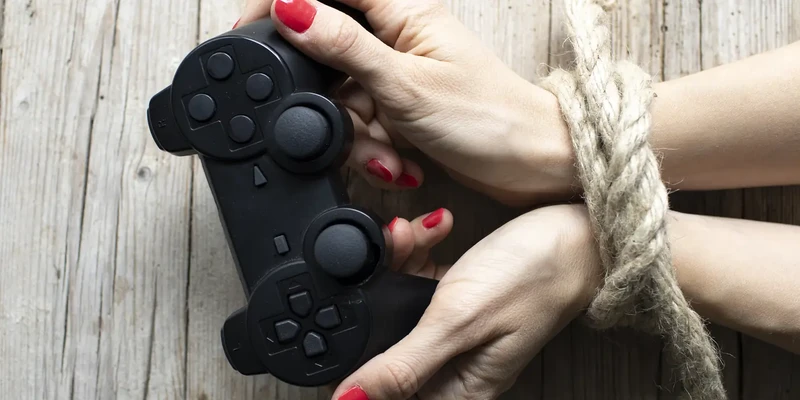 liberty gaming addiction two hands holding video game controller blog game overdertoza addiction